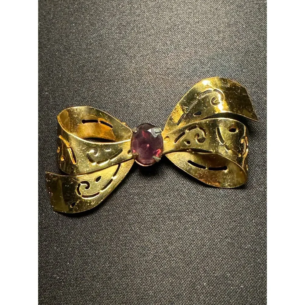 Vintage Coro Cut Out Bow Purple Glass Stone Brooch